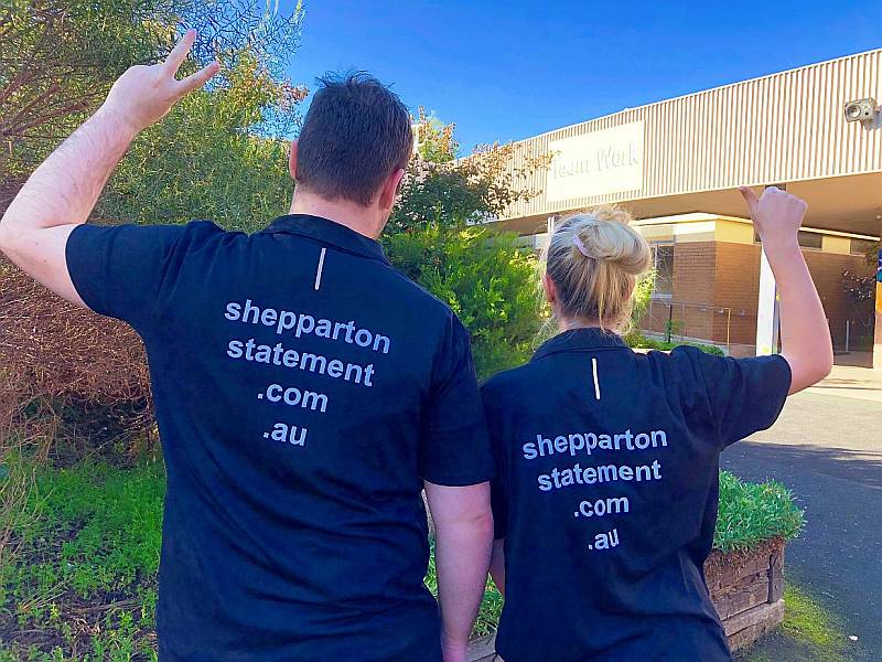 Sterling and Jess modeling our Shepparton Statement shirts.